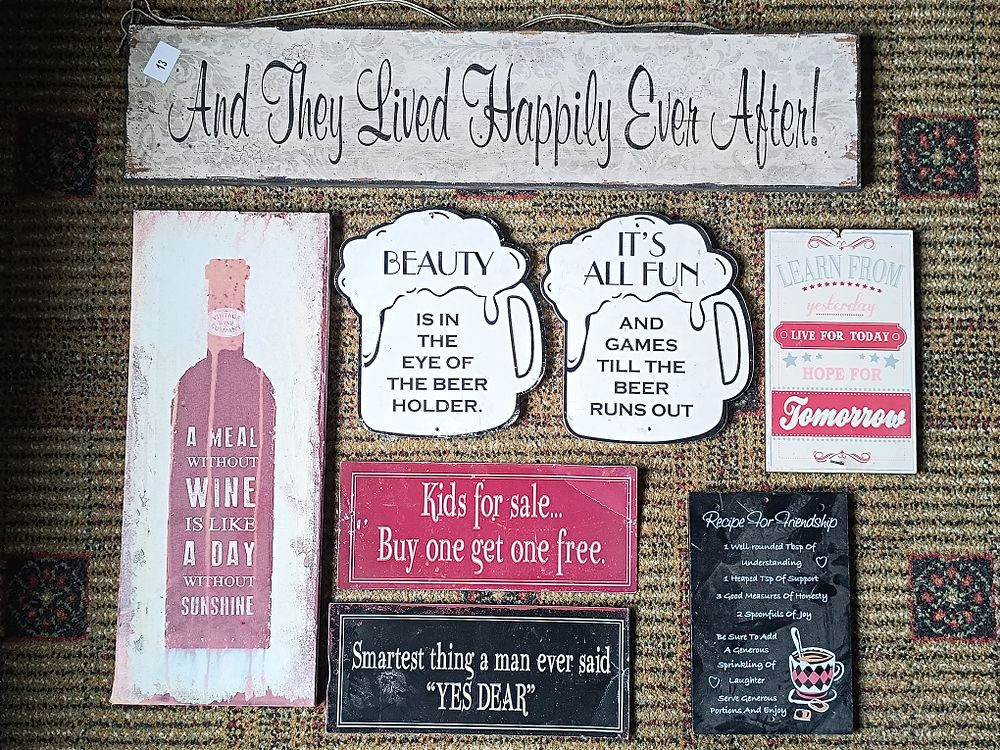A Collection of Eight Contemporary Decorative Wall Signs and Plaques