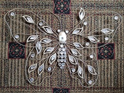 A Decorative Contemporary Metal and Faceted Element Butterfly Wall Hanging