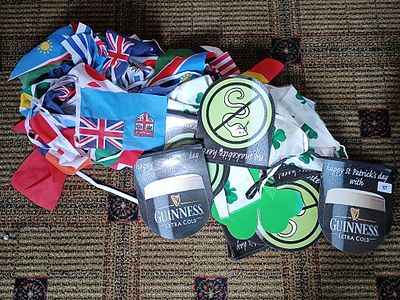 A Collection of Guinness St. Patrick's Day Promotional Items and National Flags