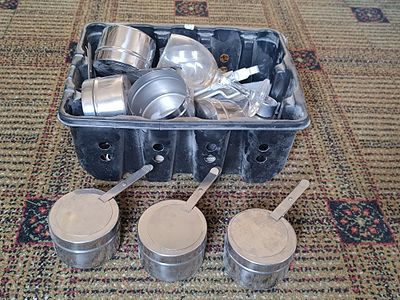 A Collection of Metal Fondue Burners
