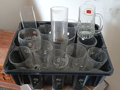 A Collection of Modern Promotional Clear Glass Barware, including Guinness and Watney's