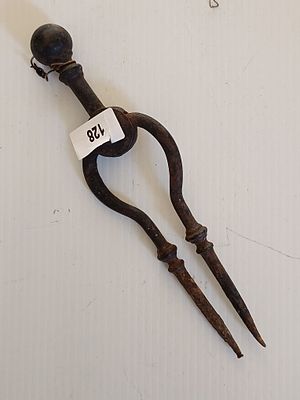 A Vintage Wrought Iron Fireplace Tongs
