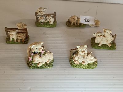 A Group of Six Rustic-Style Pig Figurines