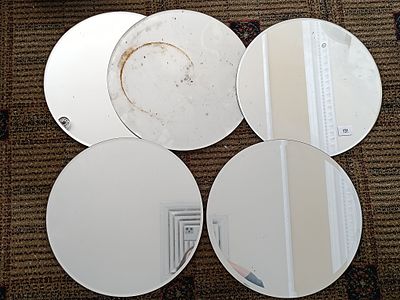 A Set of Six Contemporary Circular Glass Mirrors