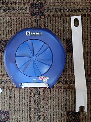 A Bay West 80350 3-Roll OptiCore™ Tissue Dispenser