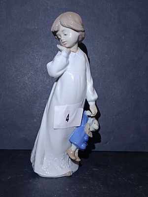 NAO by Lladro 'My Rag Doll' Porcelain Figurine