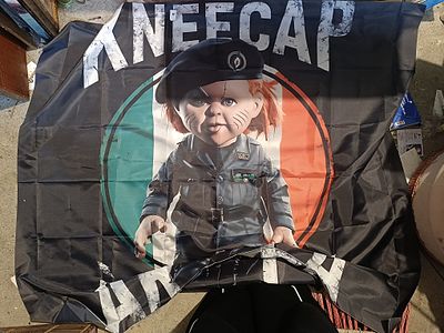 Modern Printed Fabric Banner featuring 'Chucky' in Military Uniform, Irish Tricolor, and 