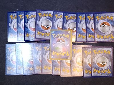 A Collection of 19 Pokémon Trading Card Game Cards, Mixed Finishes