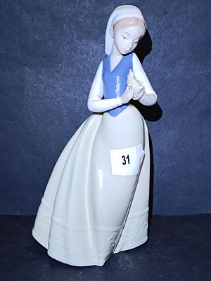 A Vintage Nao by Lladro 'Feathered Friend' Porcelain Figurine