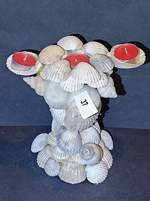 A Coastal-Style Seashell Three-Light Candle Holder