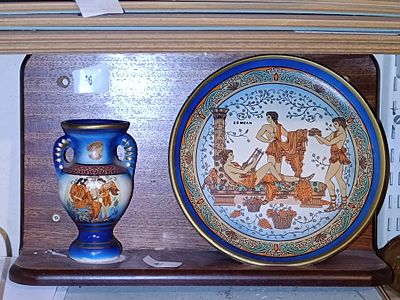 A Pair of Hand-Painted Greek Revival Style Terracotta Ceramic Items, comprising a Wall Plate 