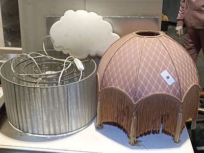 A Collection of Three Lighting Fixtures, including an Aspen Creative Handsewn Bell-Shaped 