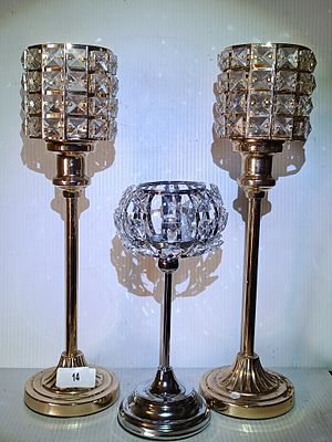 A Three Modern Metallic and Crystal Candle Holders