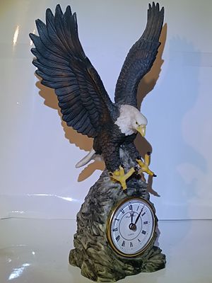 A Late 20th Century Painted Resin Bald Eagle Figural Quartz Clock, dated 1994-Approx. 35cm