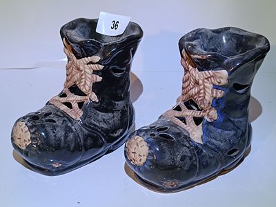 A Pair of Ceramic Novelty Boot-Shape Oil Burners