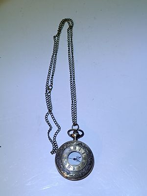 A Brass-Toned Classic Roman Numeral Quartz Pocket Watch with Chain
