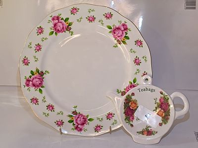 A Royal Albert 'Old Country Roses' Tea Bag Holder and 'New Country Roses' Plate