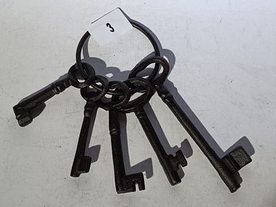 A Group of Cast Iron Jailer Style Skeleton Keys