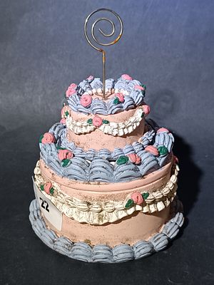 A Resin Three-Tiered Cake Form Trinket Box and Card Holder
