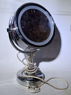 A Contemporary Chrome Finish LED Illuminated Tabletop Vanity Mirror