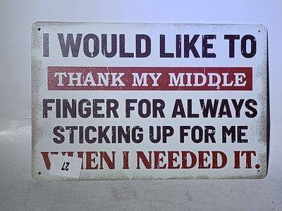 A Novelty Vintage Style Tin Man Cave Sign