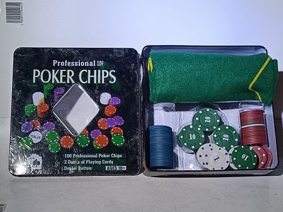 A Set of Professional Poker Chips in a Decorative Metal Tin