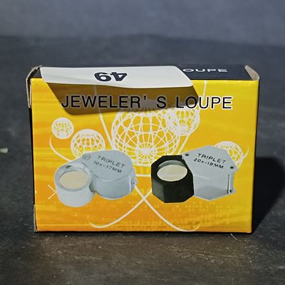 A Jeweler's Triplet Loupe in Original Packaging