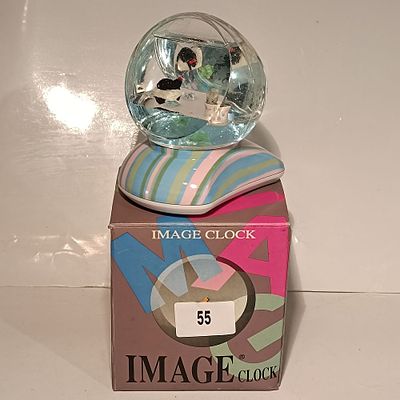 Image Clock Snow Globe Clock with Striped Base and Original Packaging