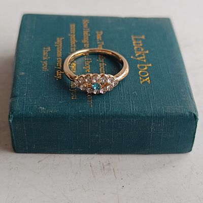 A Gold-Tone Fashion Ring with Blue and Clear Stone Cluster and Presentation Box