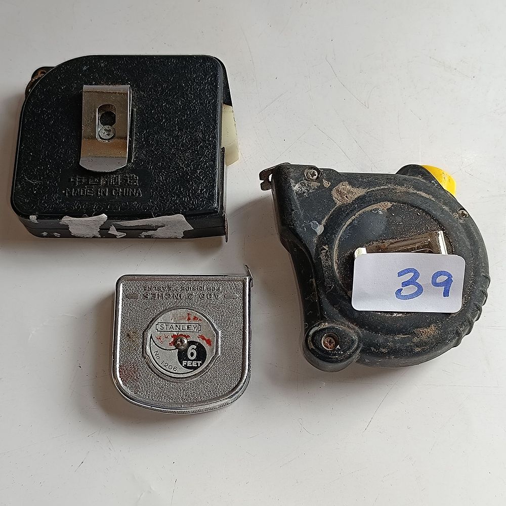 A Trio of Retractable Tape Measures Including a Stanley No. 1206