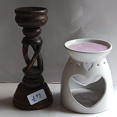 Two Candle Accessories Including a Carved Open Twist Wooden Candlestick and a Ceramic Oil Burner