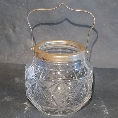 An Edwardian Cut Glass Biscuit Barrel with Silver-Plated Mounts