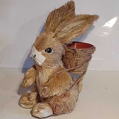 A Decorative Sisal Fiber Rabbit Figurine with Woven Basket