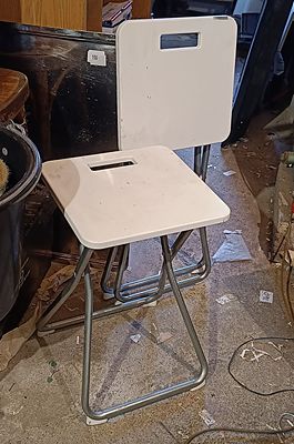 A Group of IKEA GUNDE Folding Stools