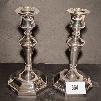 A Pair of Queen Anne Style Silver-Plated Candlesticks