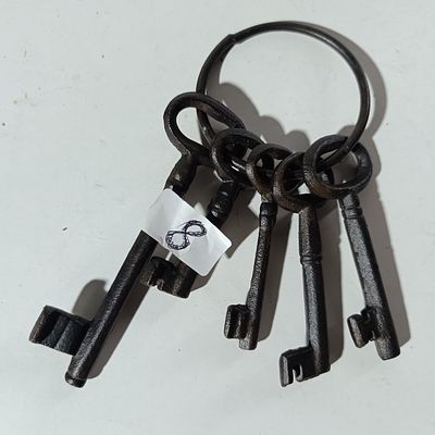 Set of Five Cast Iron Skeleton Keys on Large Metal Ring