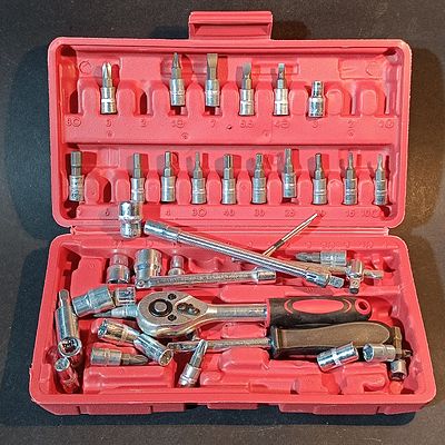 A 1/4-Inch Drive Metric Socket and Driver Bit Set in Red Case