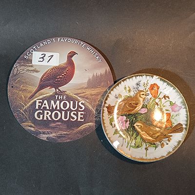 Two Items Comprising a Famous Grouse Advertising Sign and a Bird Themed Decorative Plate