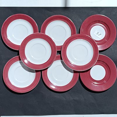 Set of Eight Herrandiz Red-Rimmed Ceramic Saucers