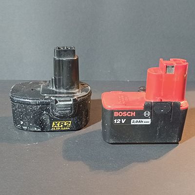 Two Cordless Power Tool Battery Packs Including Bosch 12V and DeWalt-Style 14.4V