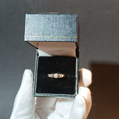 9 Karat Yellow Gold and Diamond Solitaire Ring