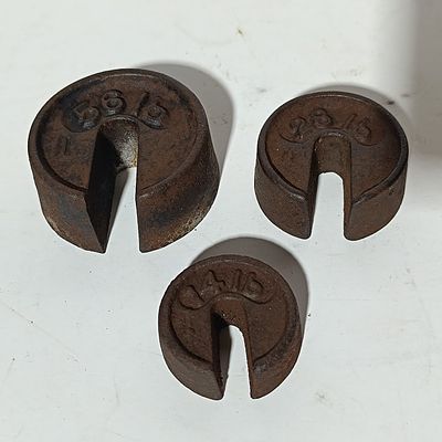 A Trio of Cast Iron Slotted Platform Scale Weights