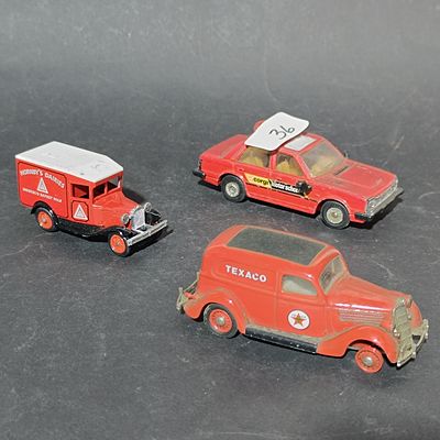 Three Vintage Red Die-Cast Model Vehicles Including Corgi Motorschool Sedan and Texaco Delivery Van