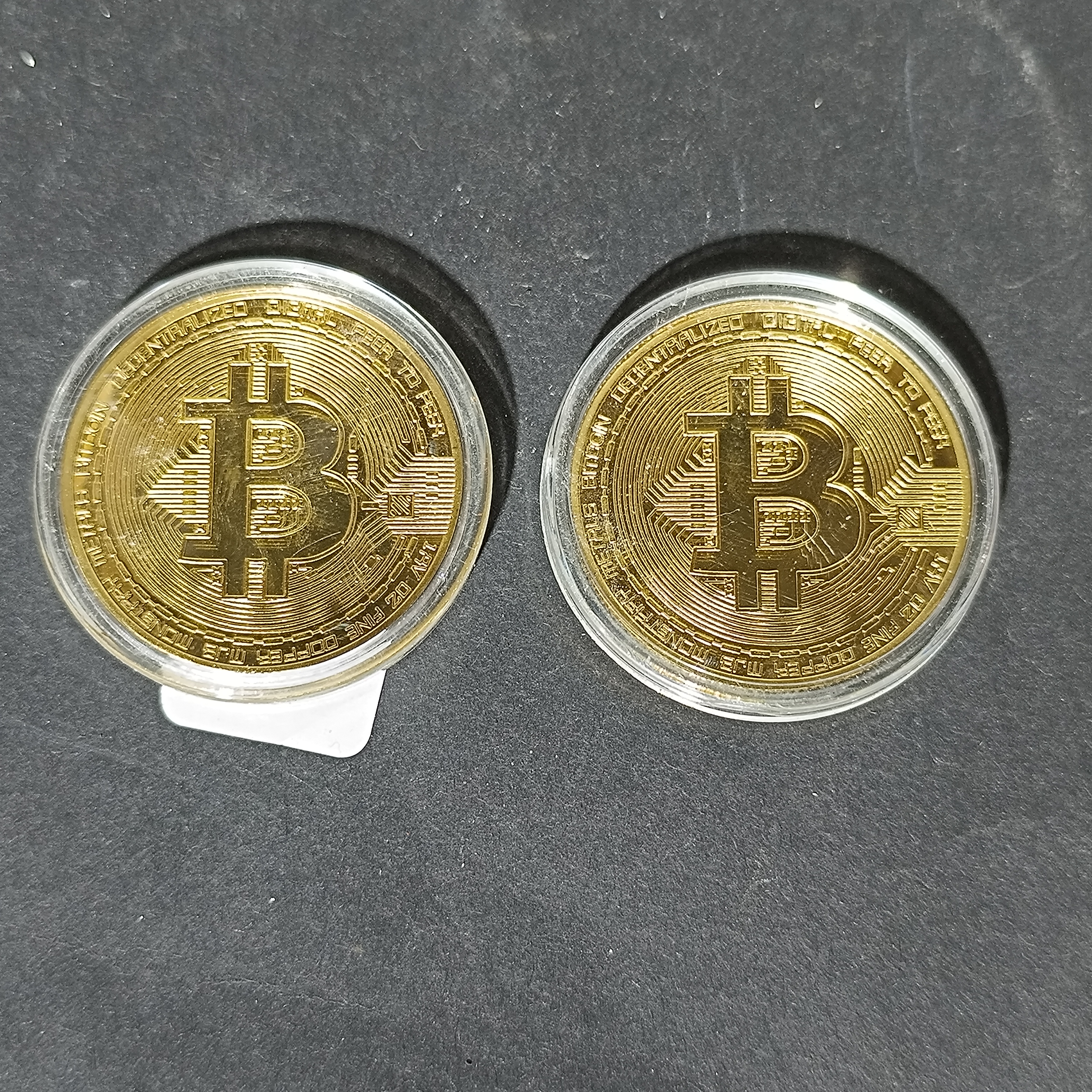 A Pair of MJB Monetary 2013 Bitcoin Commemorative Medals