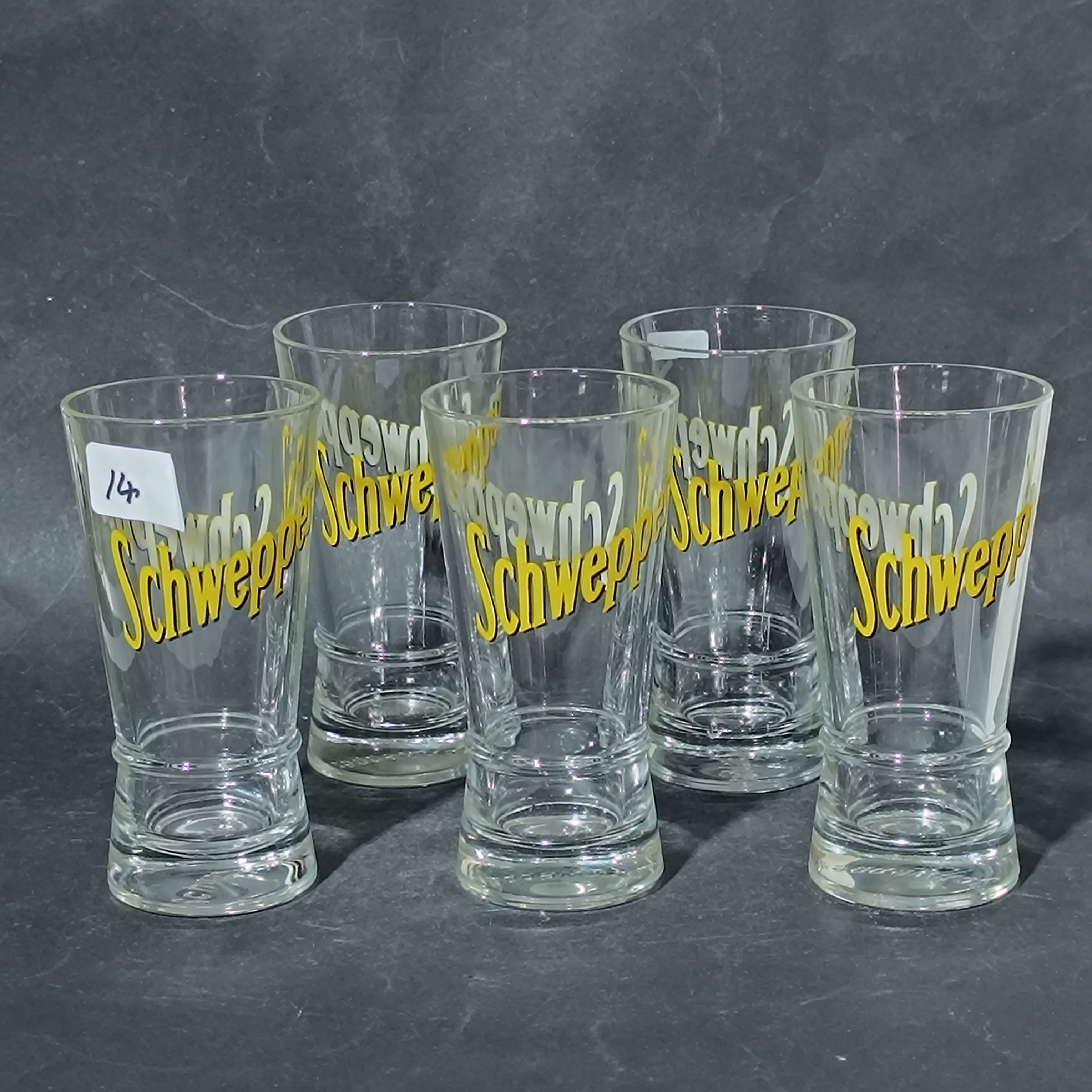 A Set of Schweppes Branded Glass Tumblers