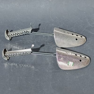 A Pair of Vintage Clarks Hammered Metal Adjustable Shoe Trees