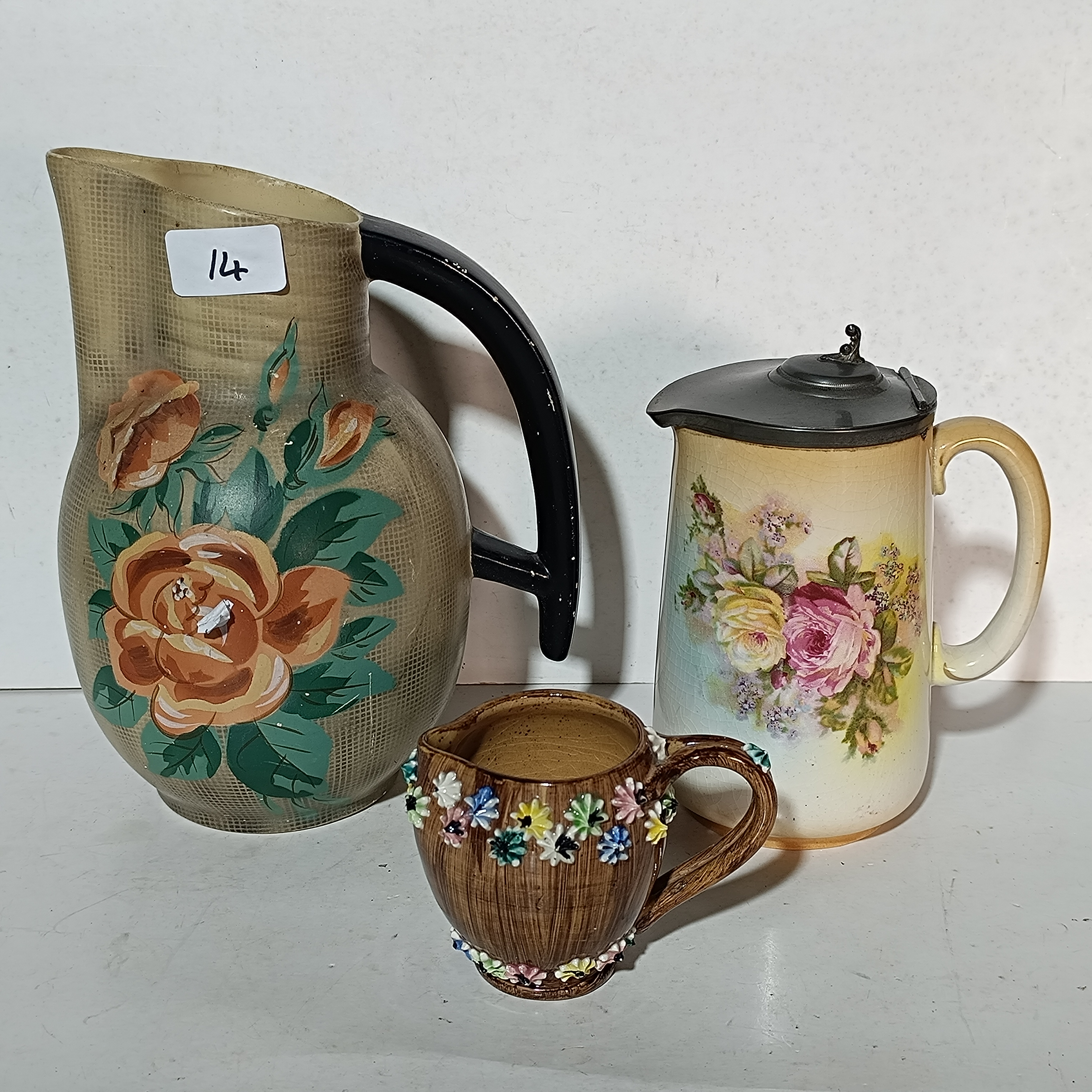 A Trio of English Floral Ceramic Pitchers including Branleigh Ware