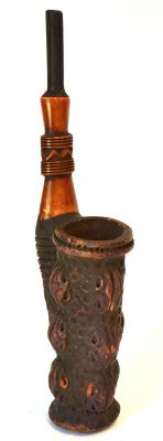 Cameroon Pottery Pipe. Multi Head decorations. Natural tusk carved stem. 13"H Condition: Part 1 
