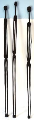 East African Pole Figures (3). Two females and a male Heads and faces quite different. . 