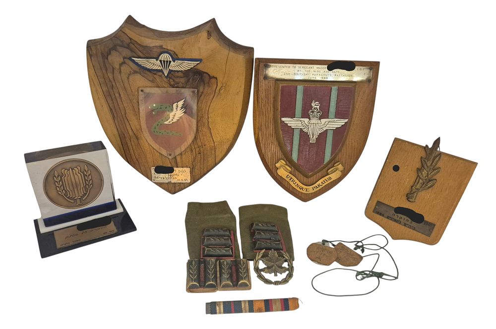 Lot of Israeli military items, awars, pins, dog tags, etc. 
Belonged to former Mossad agent. 